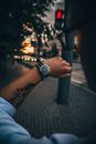 A Man With Tattooed Arm Wearing a Wristwatch