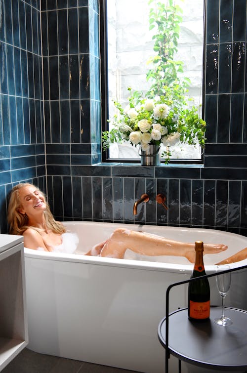 A Woman Soaking in a Bathtub 