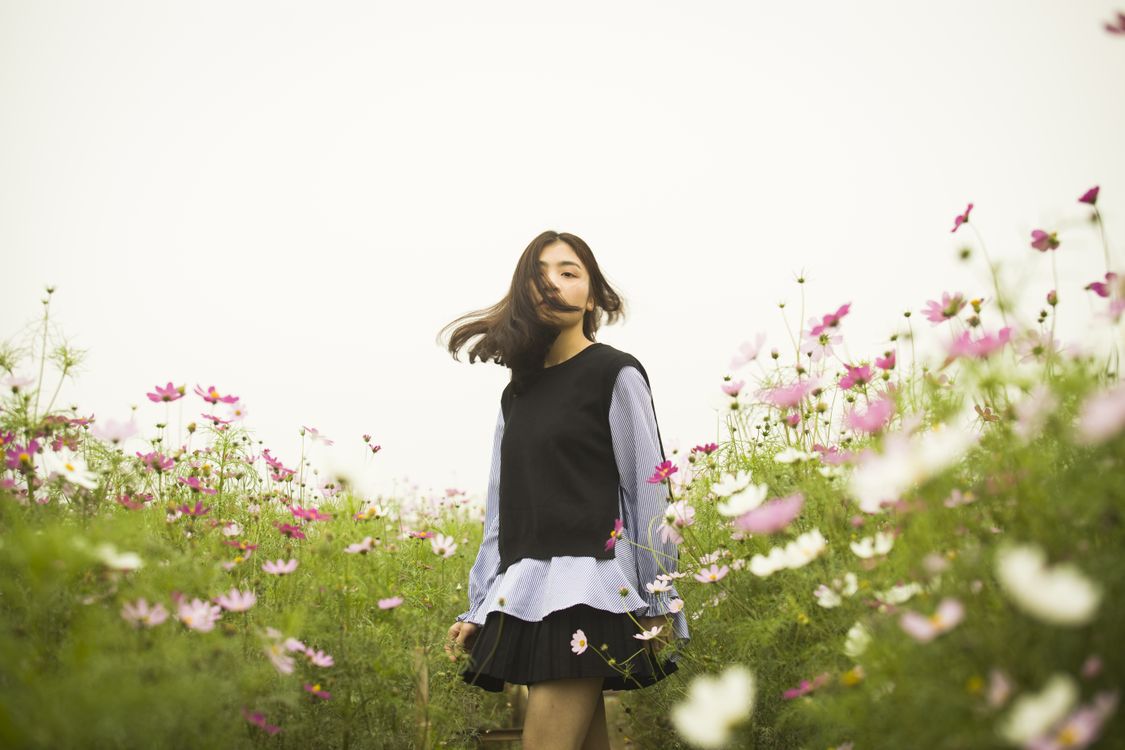 Woman Standing in the Flower Field · Free Stock Photo