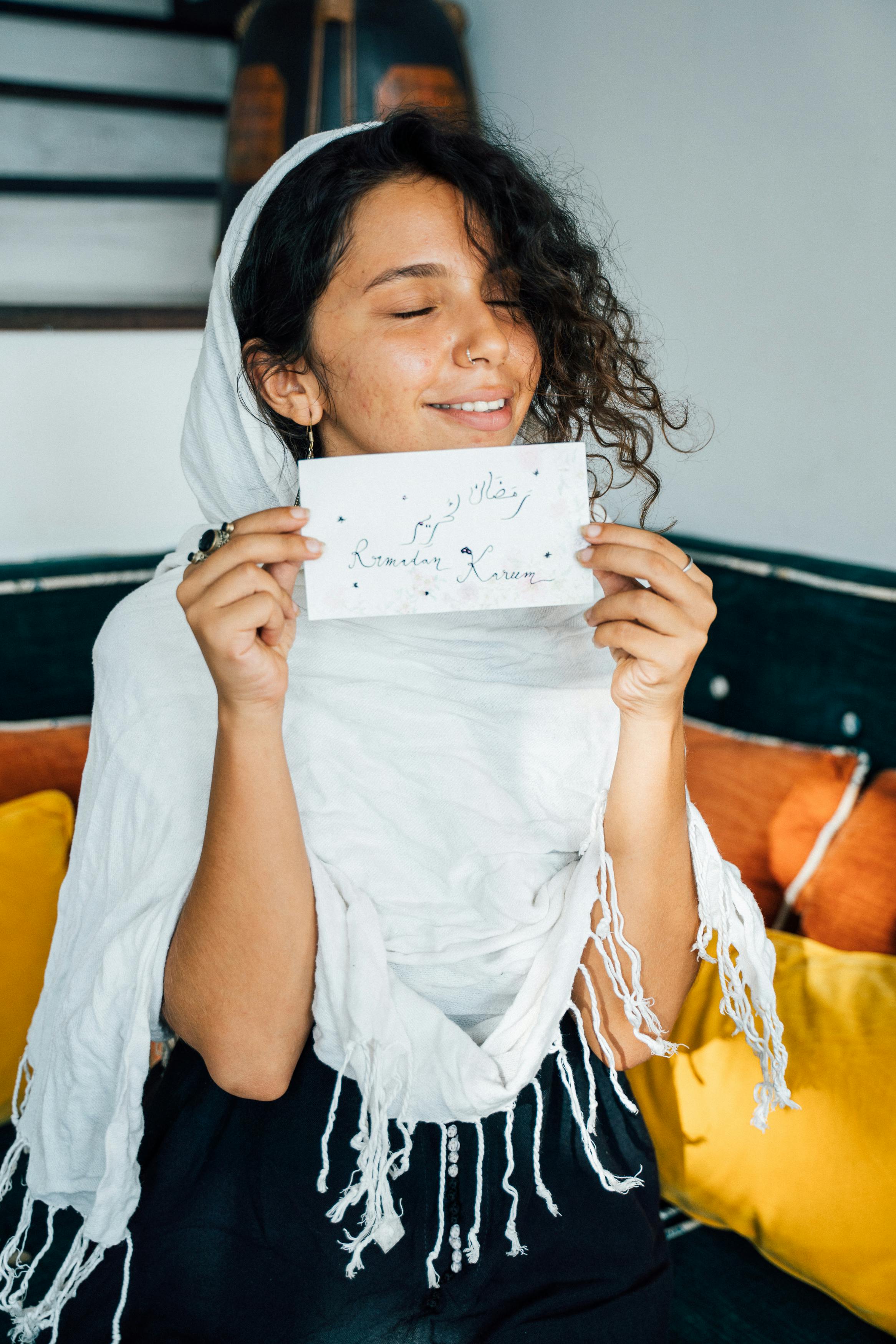 Person Showing a Letter · Free Stock Photo