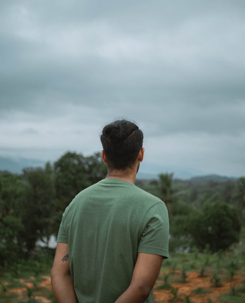 Back View of a Man Wearing Green Shirt