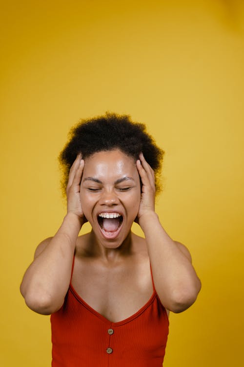 A Screaming Woman in Red Tank Top