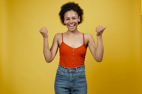 Free Woman in Tank Top Smiling Stock Photo