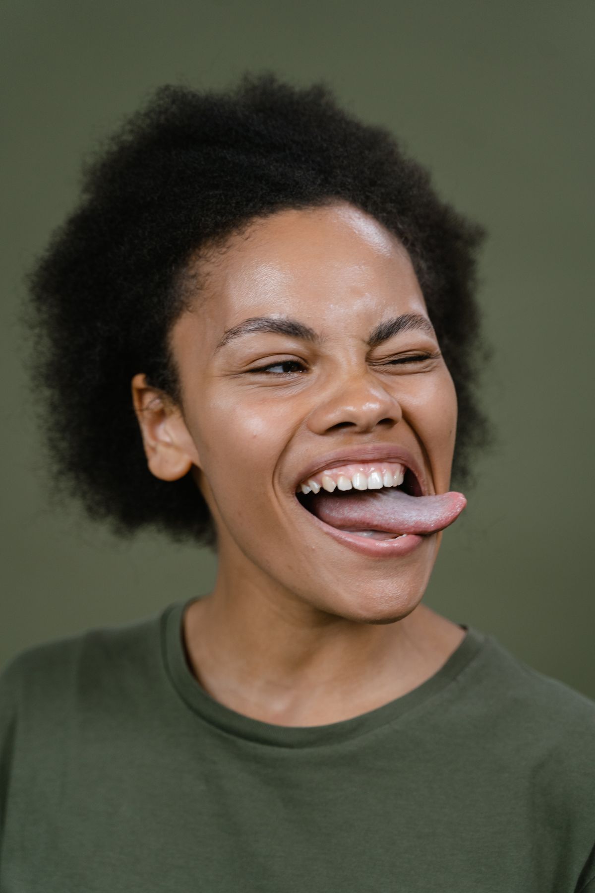 Smiling woman with afro hair