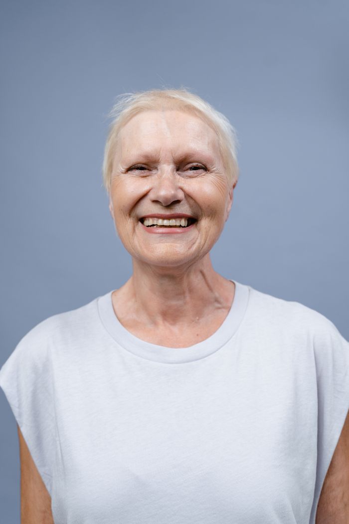 Portrait of a smiling broadcaster — photo by Tima Miroshnichenko on Pexels