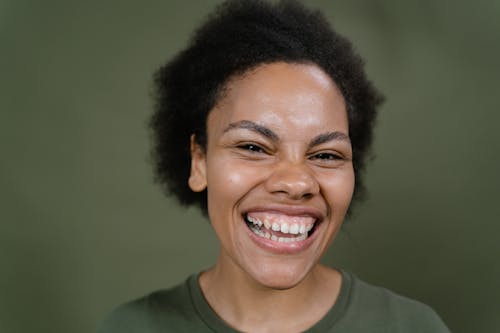 A Close-up Shot of a Happy Woman