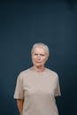 Elderly Woman in Brown Shirt