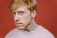 Close Up Photo of a Man with Facial Hair