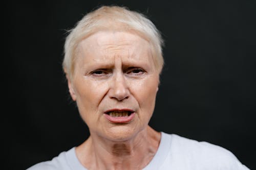 Close Up Photo of Elderly Woman