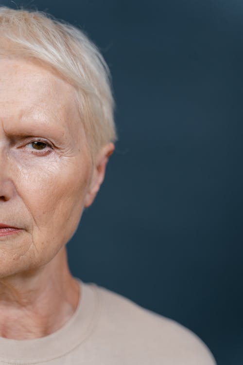 Close Up Photo of Elderly Woman's Face