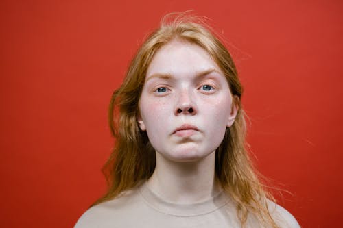Studio Shot of a Young Woman Making an Angry Face