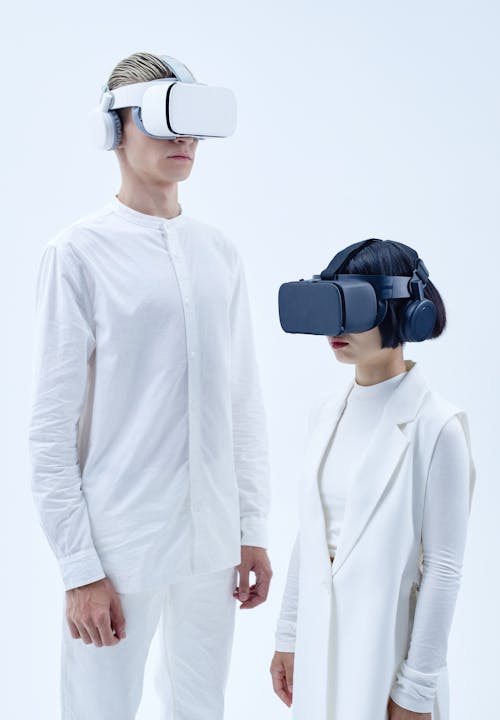 Man and Woman Wearing Oculus Quest