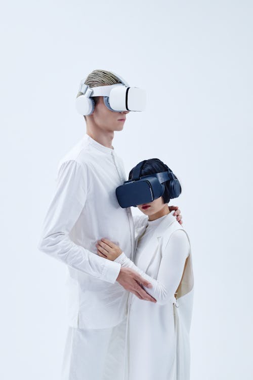 A Man and Woman Using a VR Goggles