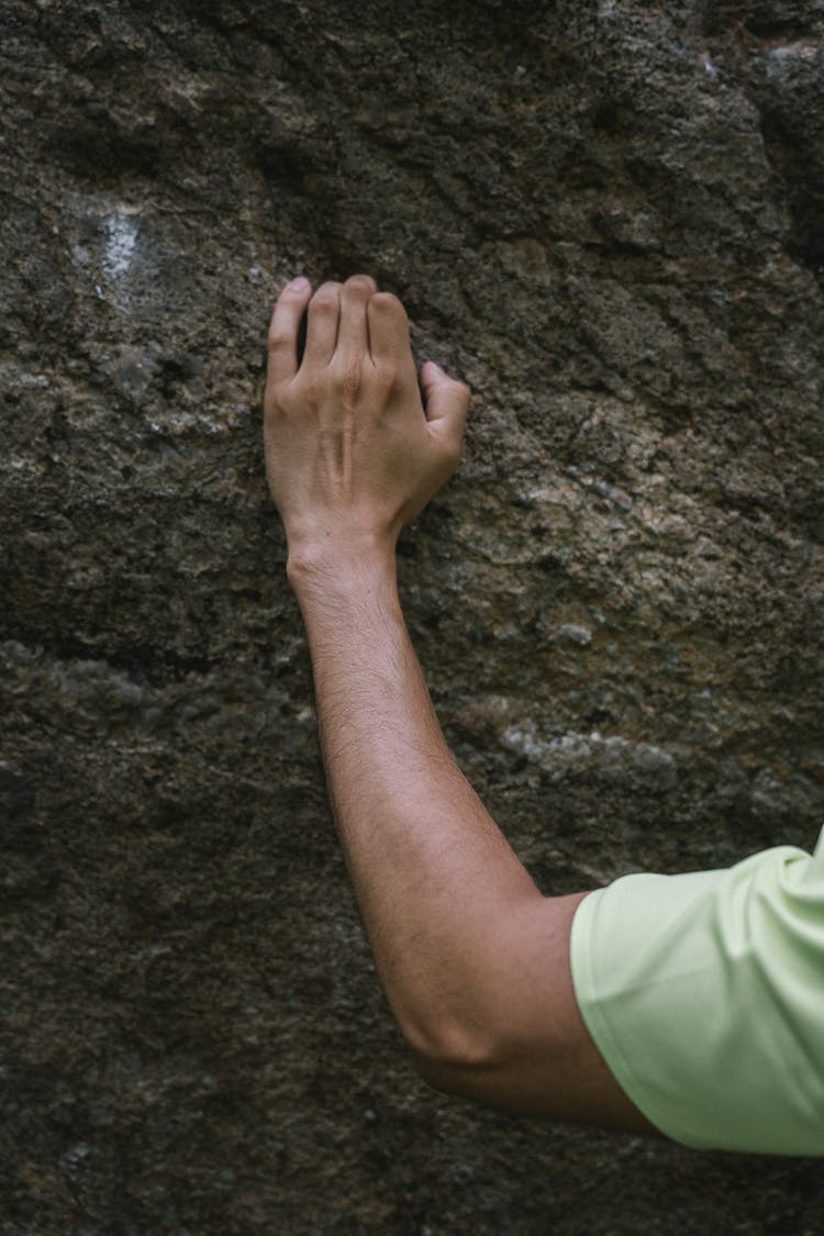 Hand Holding On Rock