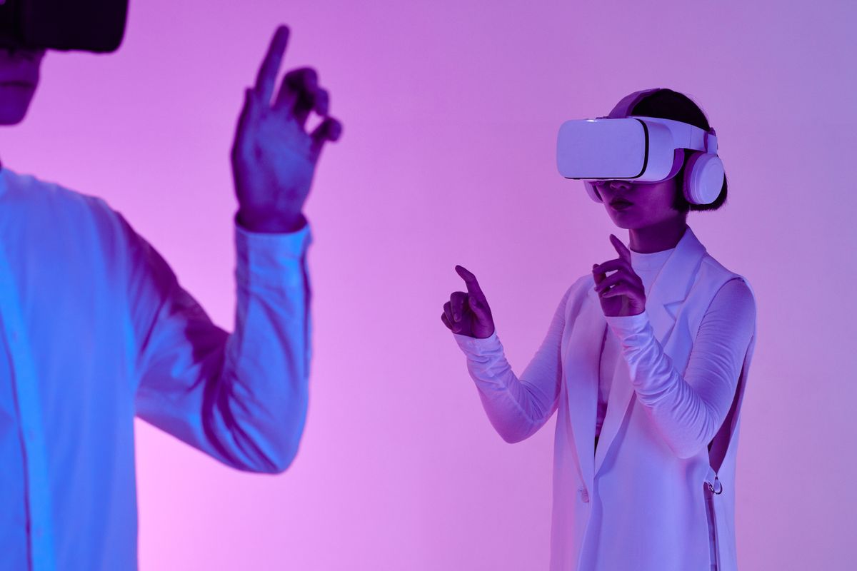 Team collaborating with VR and futuristic technology