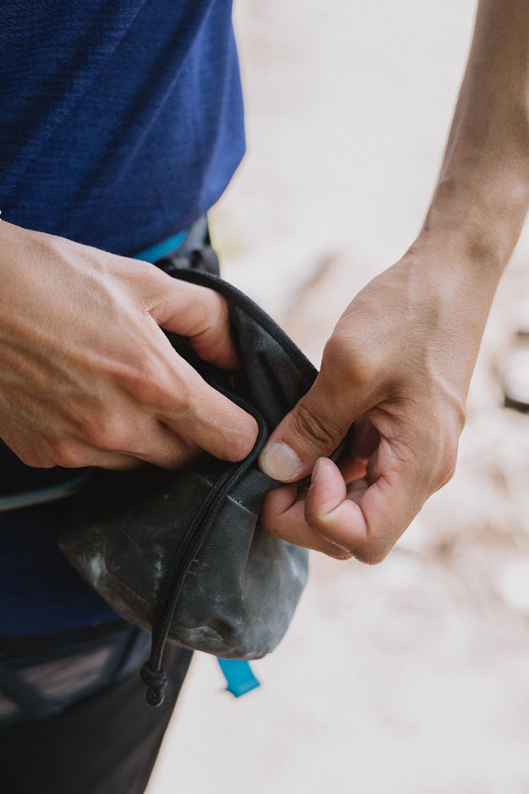 Unrecognizable Man Opening Leather Purse