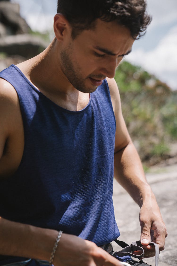 Man Frowning On Sports Equipment