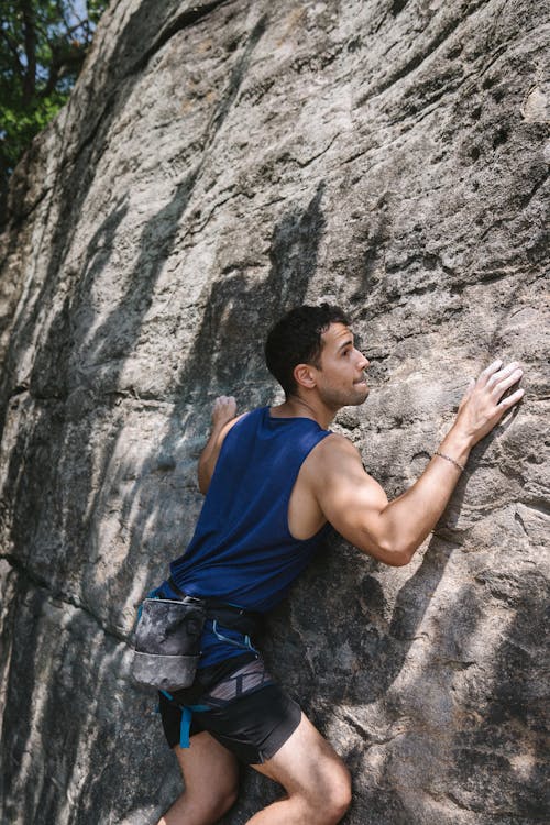 Photo of a Person Rock Climbing