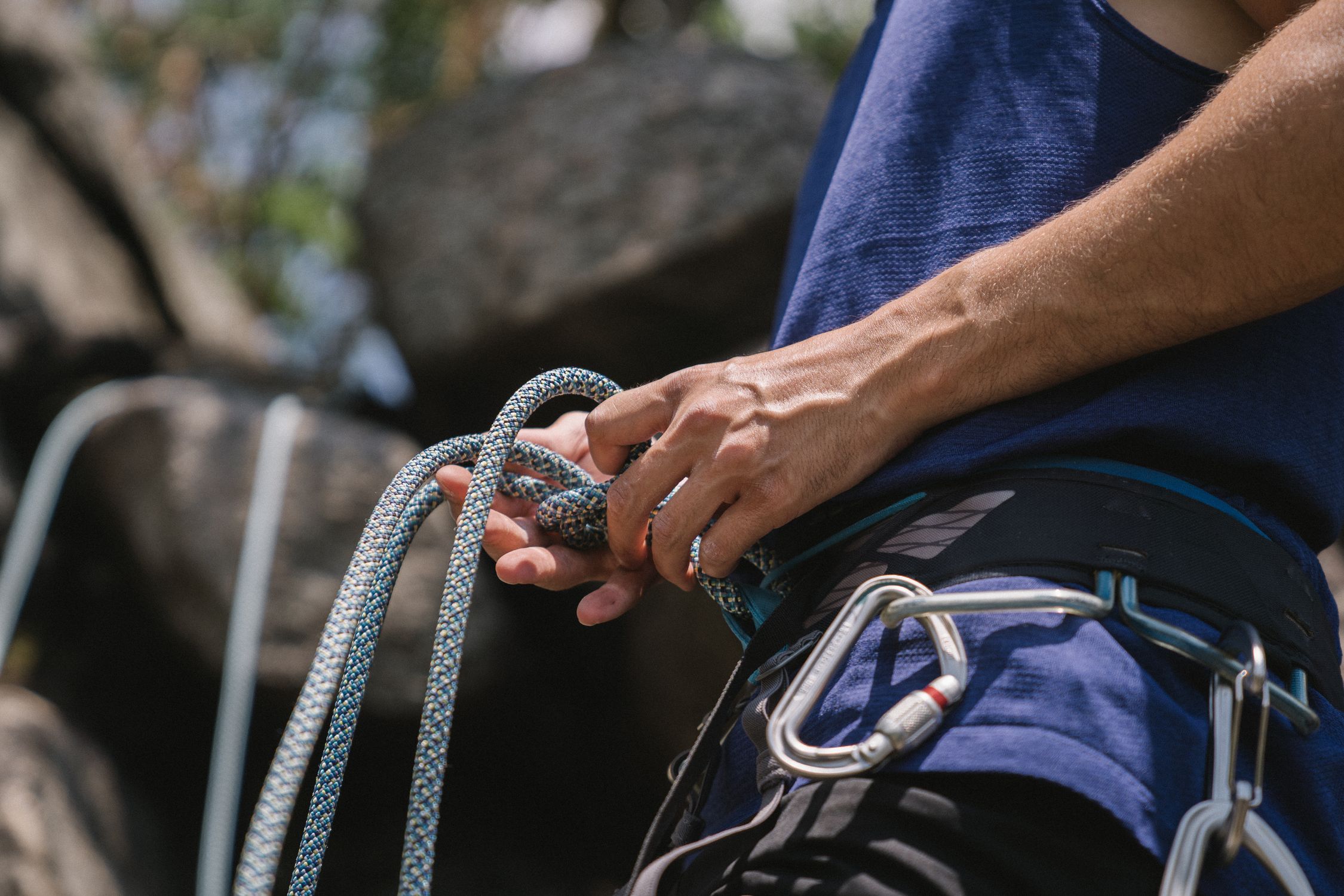 Man Tying Rope Around his Waist · Free Stock Photo