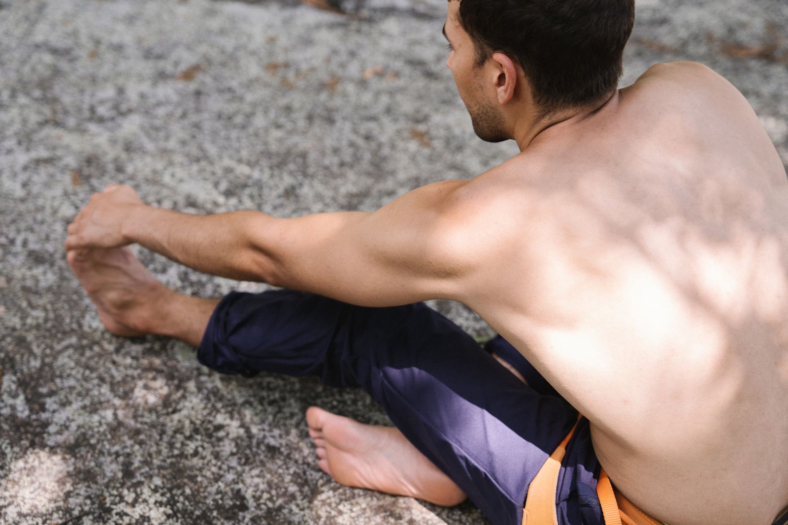 Person receiving warm lower back care in a bright wellness setting