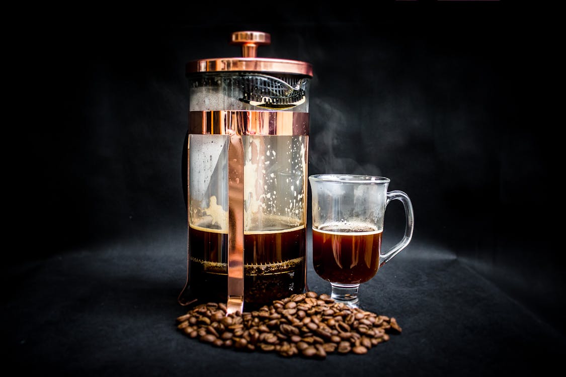 Free Photo of Coffee Warmer Pump Jar Filled With Coffee Stock Photo