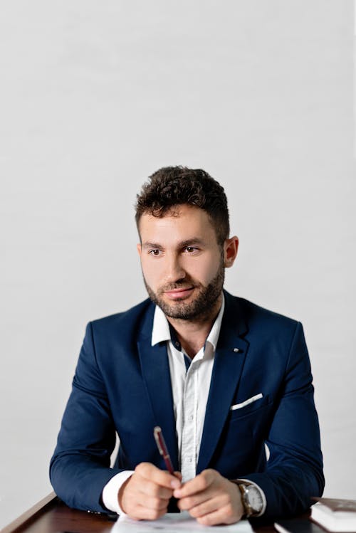 A Businessman in Blue Suit 