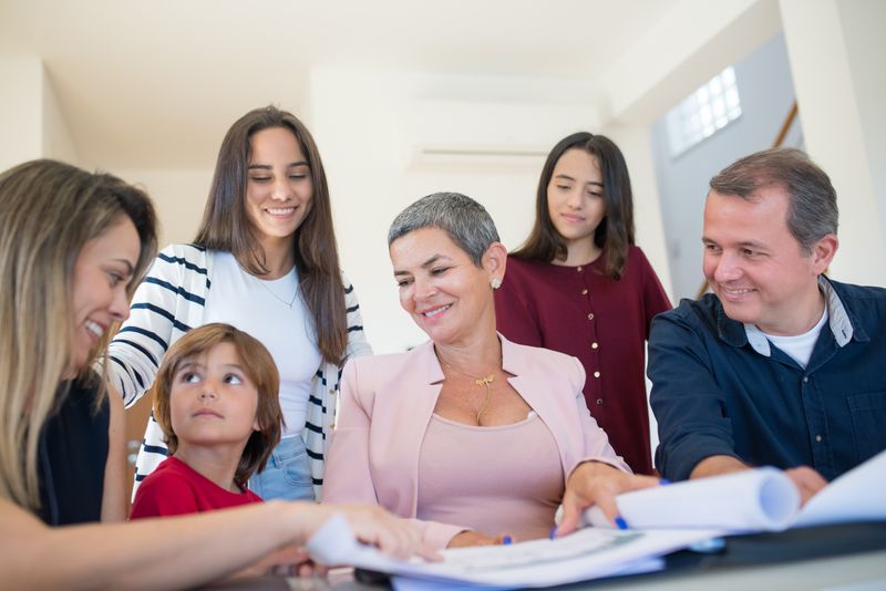 Intergenerational family discussing their financial legacy with a Cape Town adviser