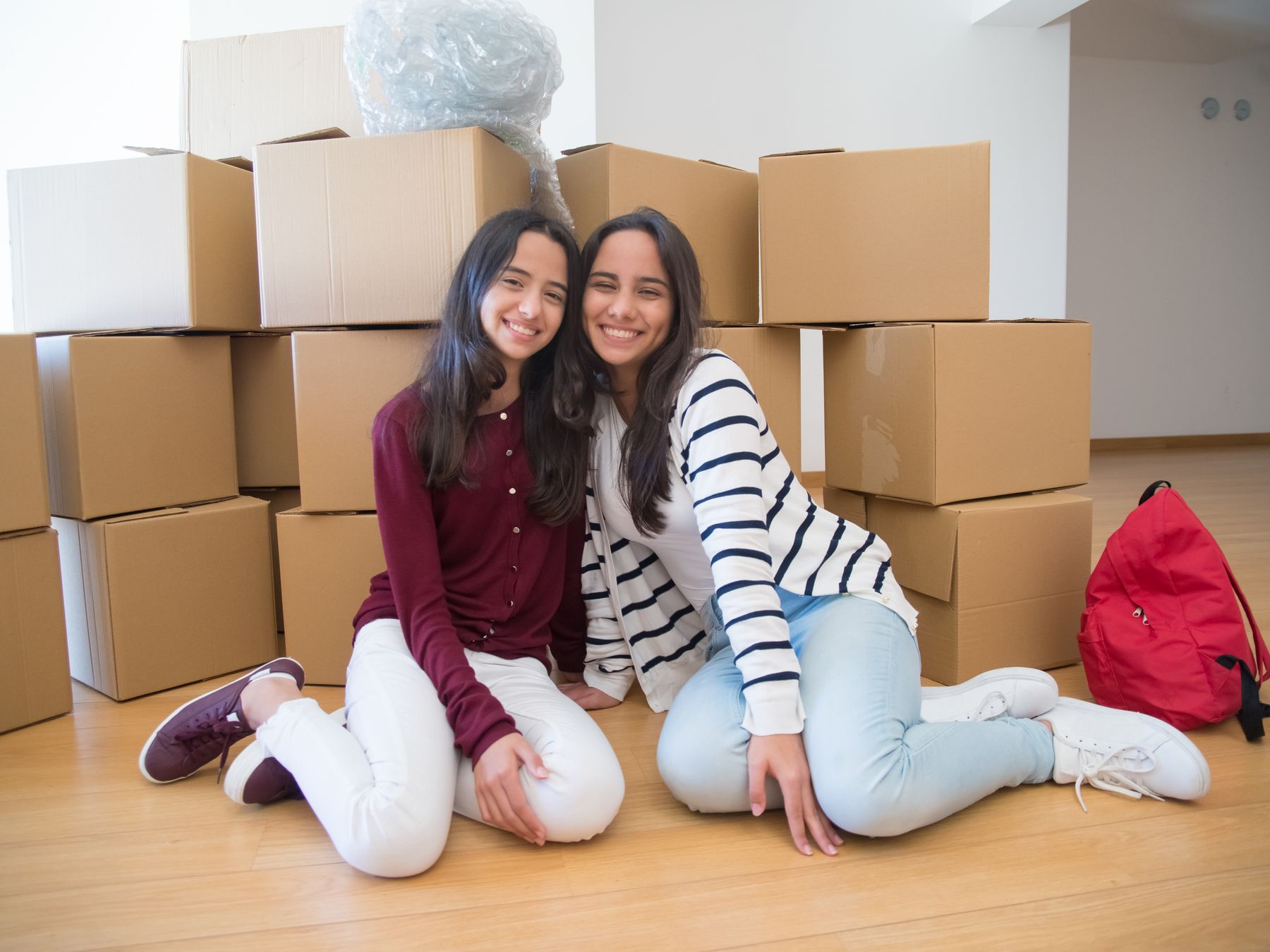 Merstham — movers carrying boxes for a flat move