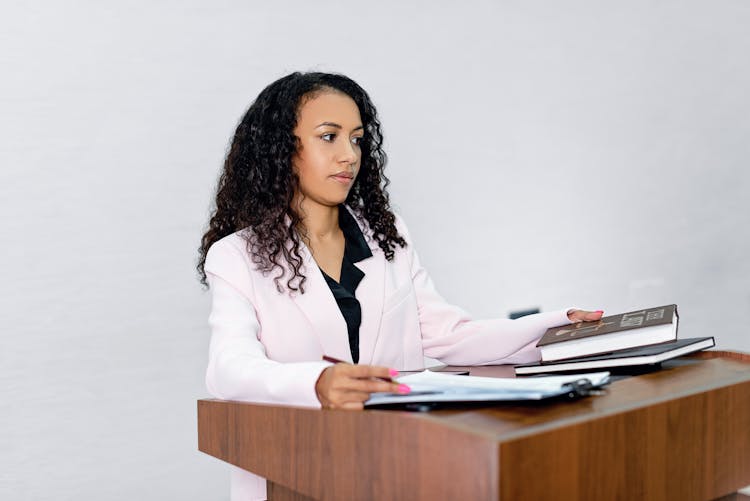 Woman At Podium