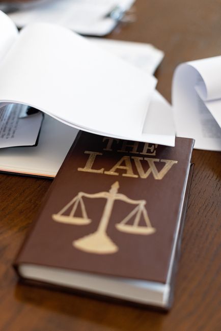 law books legal documents desk