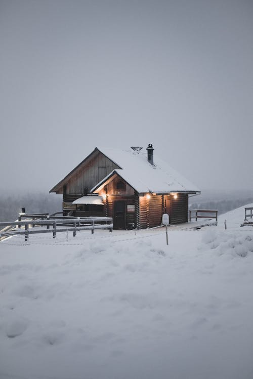 A Wooden Cabin during Winter
