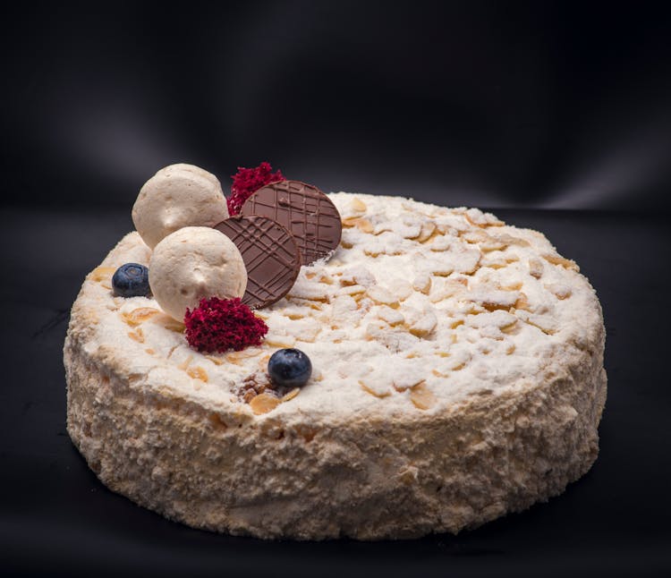 Fruit And Almond Cake Decorated With Cookies