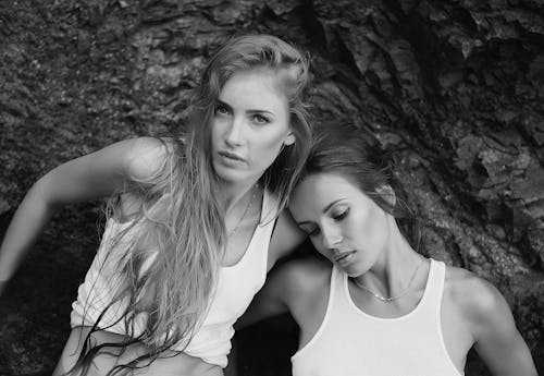 Young Women Against a Rocky Surface 