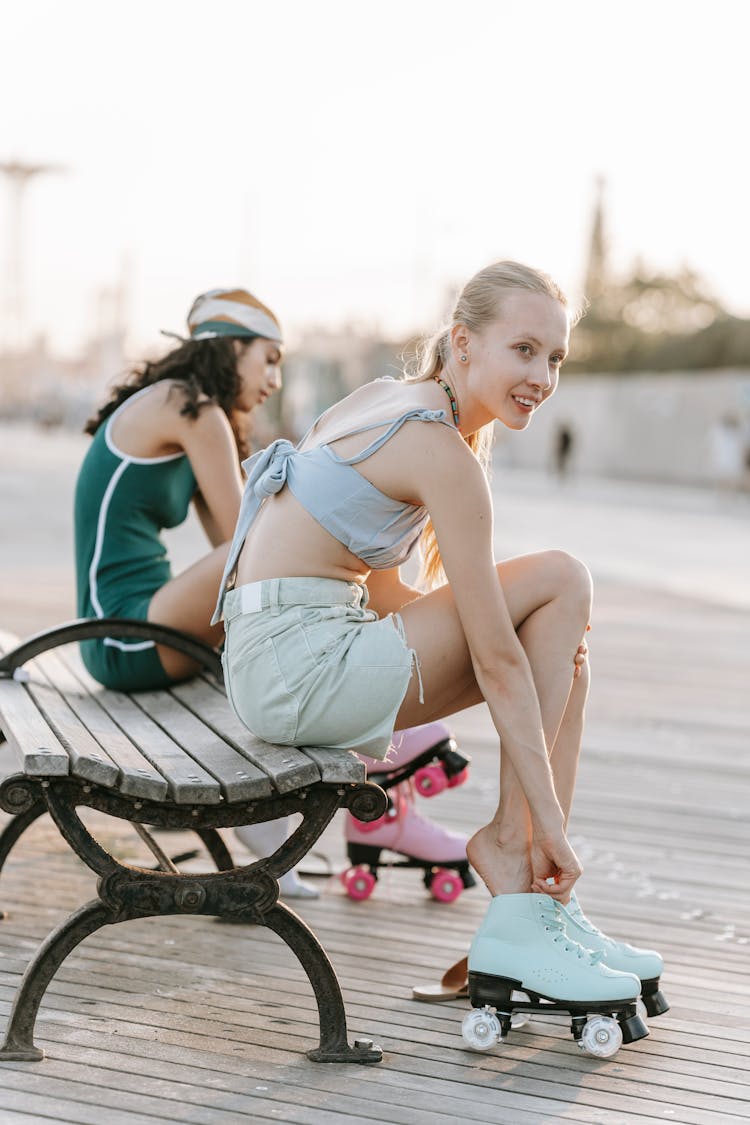 Women Putting On Skates