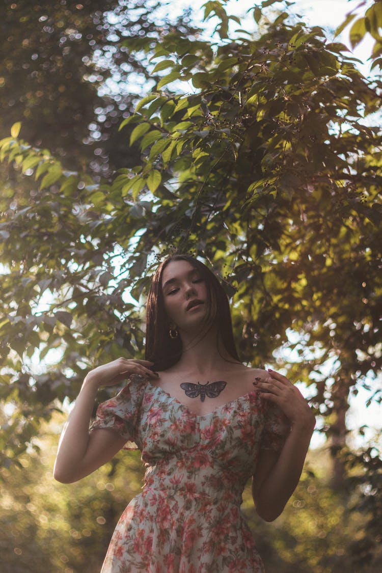 A Beautiful Woman With A Butterfly Tattoo