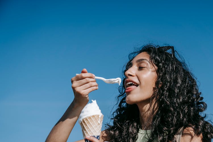 A Woman Eating Ice Cream