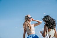 Women Spending Time Together under a Blue Sky