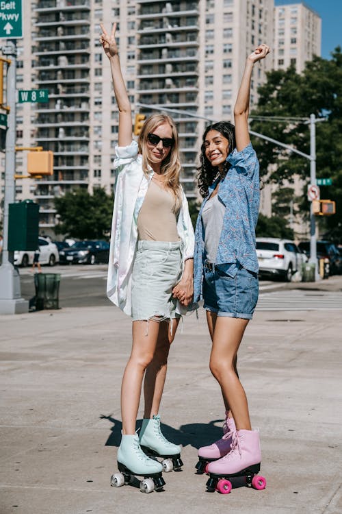 Free Two Women on Roller Skates  Stock Photo