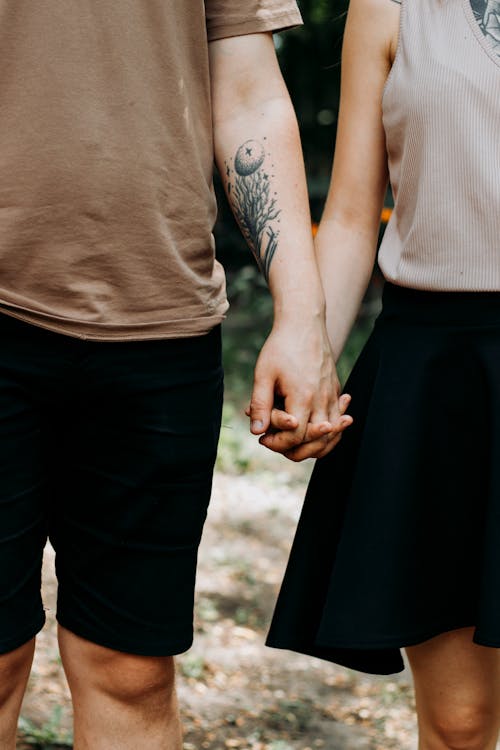Couple Holding Hands Outdoors