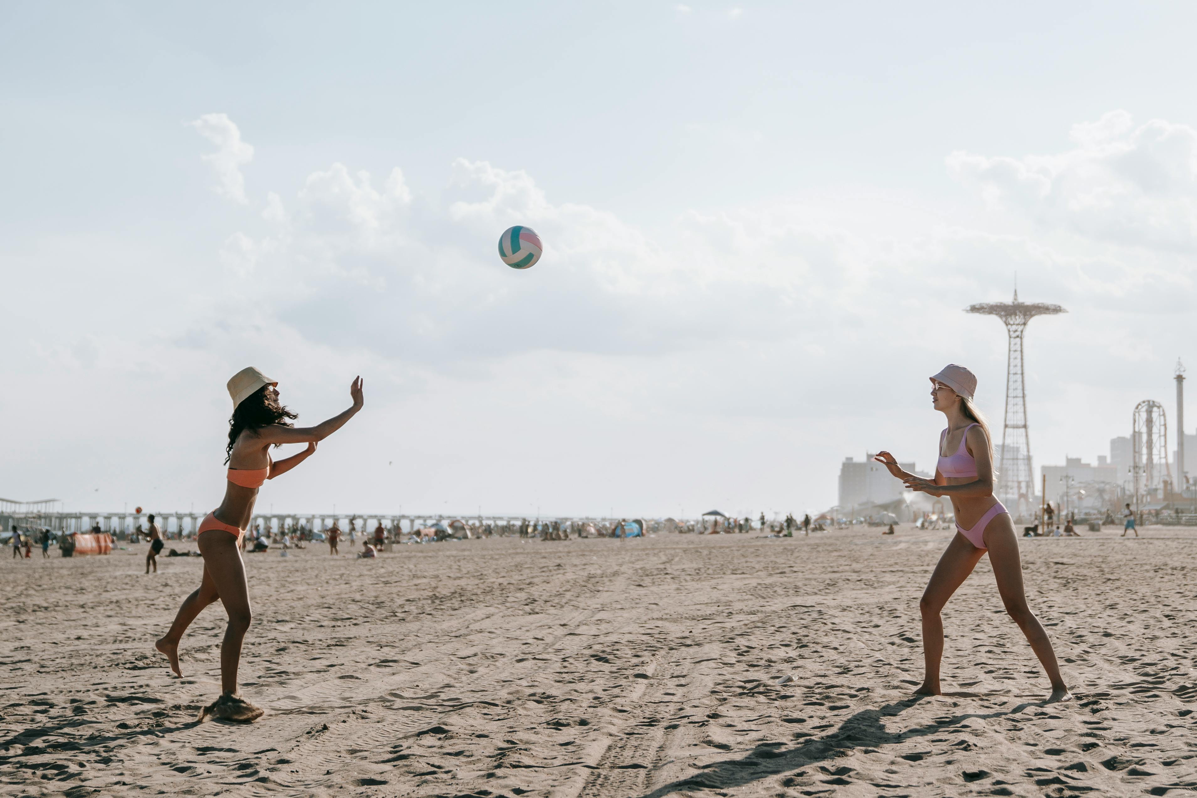 sunset volleyball game at foster beach with chicago skyline in background - edgewater chicago