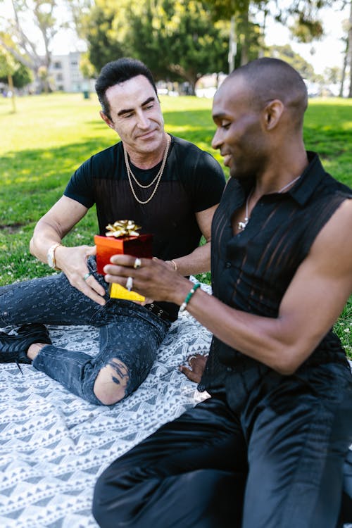 Free Two Men Exchanging Gifts Stock Photo