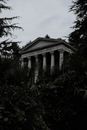 A Neoclassical Building Surrounded by Plants