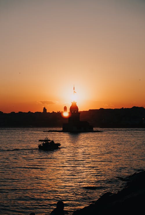 Silhouette of a Lighthouse during Sunset