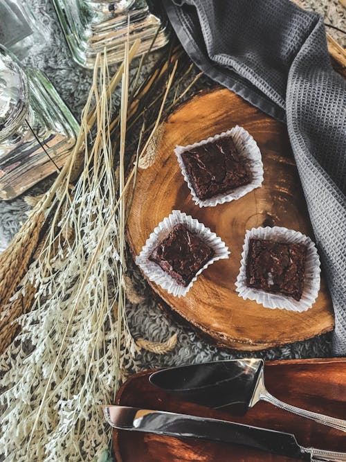 Close-Up Shot of Brownies on a Wooden Tray