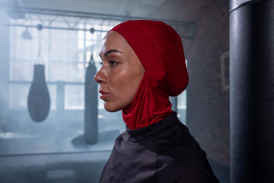 Athletic woman in hijab at the gym, demonstrating sport hijab in action