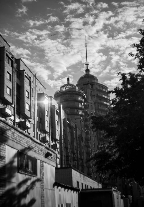 Free Black and white photo of high-rise buildings in Saint Petersburg, capturing architectural styles. Stock Photo