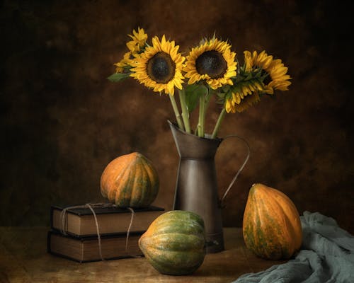 Sunflowers and Papayas on Table