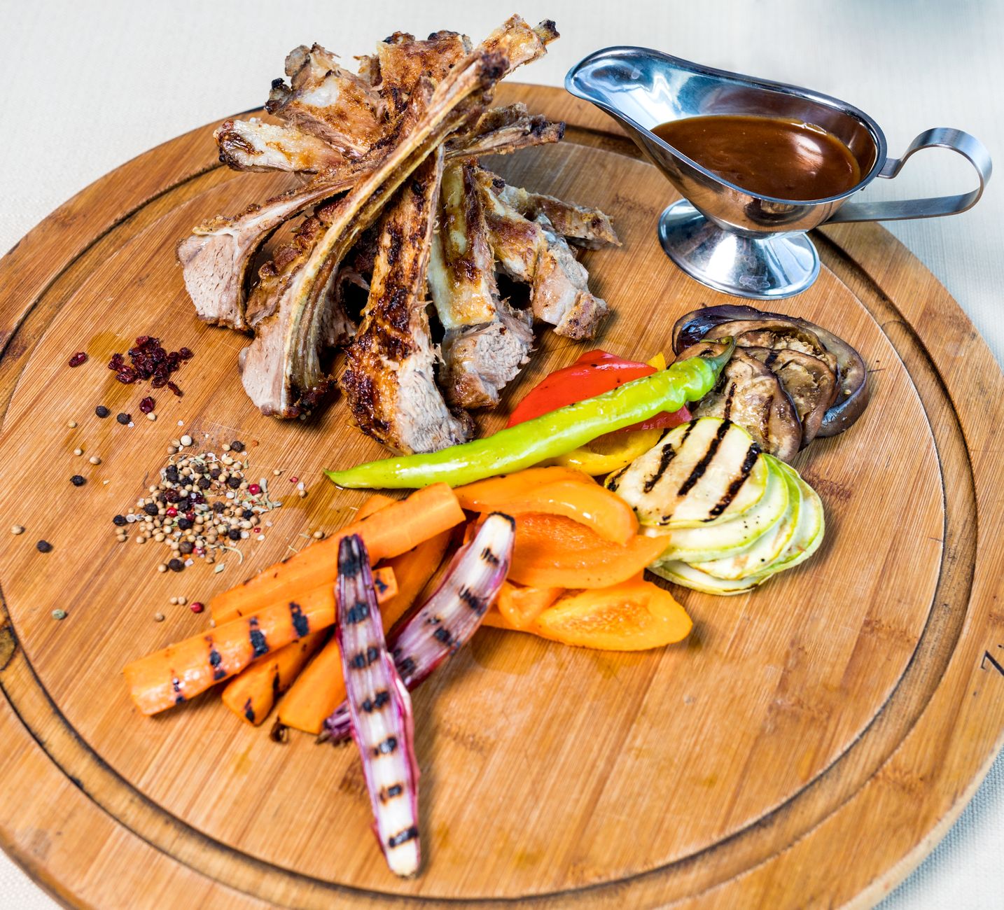 Grilled Berkshire Pork Chops with Merlot Sauce on plate