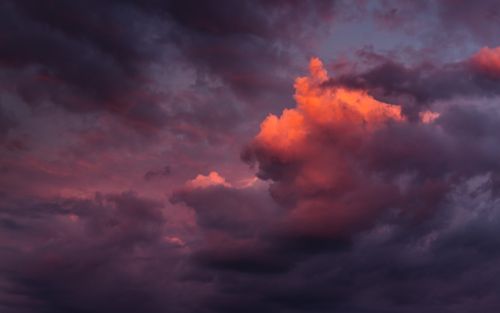 Free Vibrant sunset clouds casting dramatic colors over Poland's sky. Stock Photo