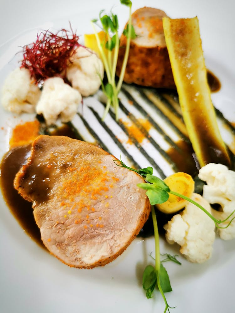 Plate Of Cold Cut Meat And Cauli